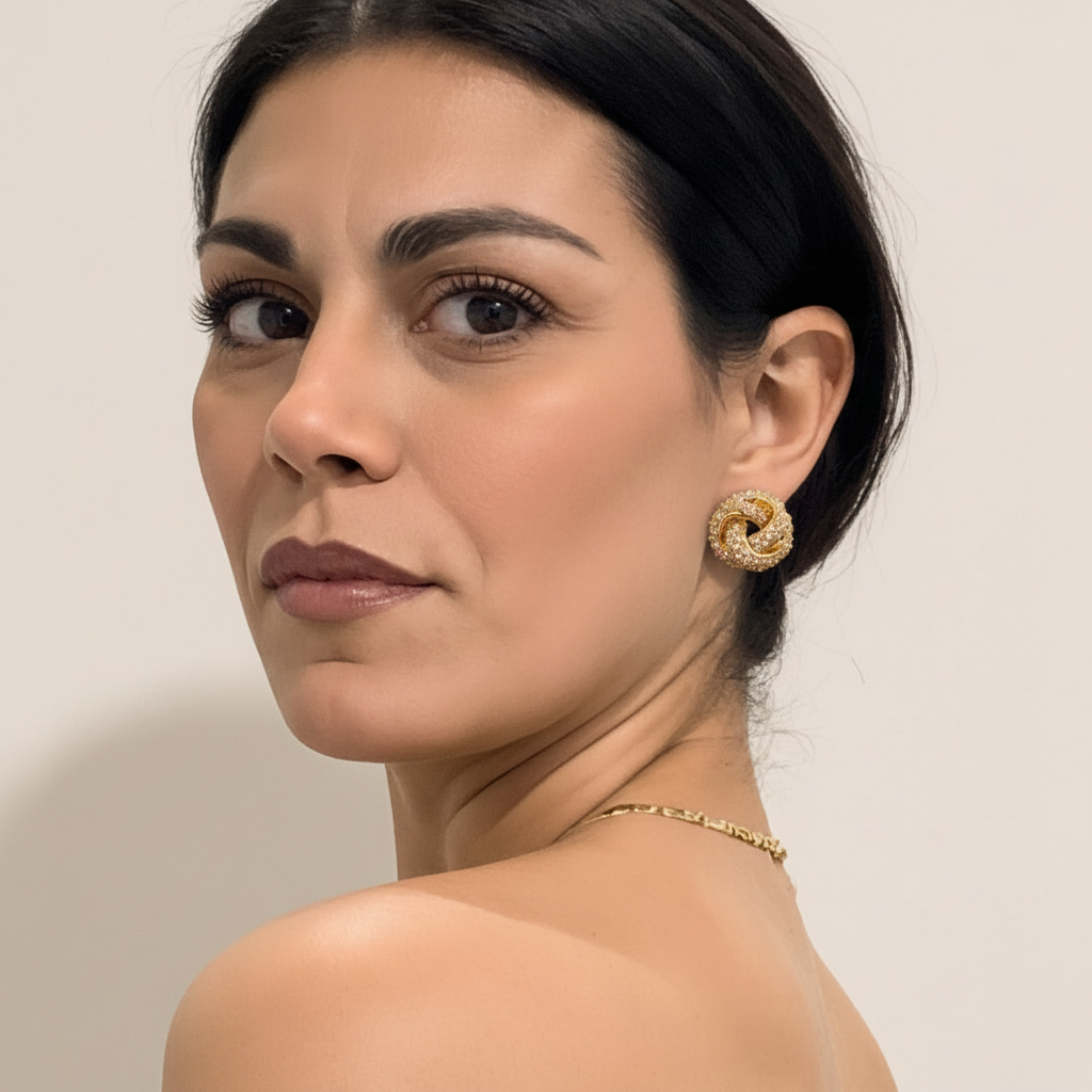 ORECCHINI IN ACCIAIO "NODO LUMINOSO"